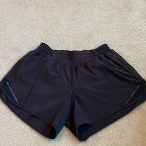 Lululemon Hotty Hot low rise short 4 inch. Black.
